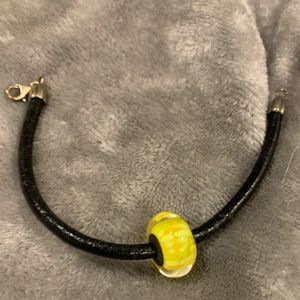 Pandora Leather bracelet with yellow floral charm